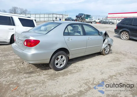 2003 Toyota Corolla Le z USA, uszkodzony, nr VIN JTDBR32E830020266